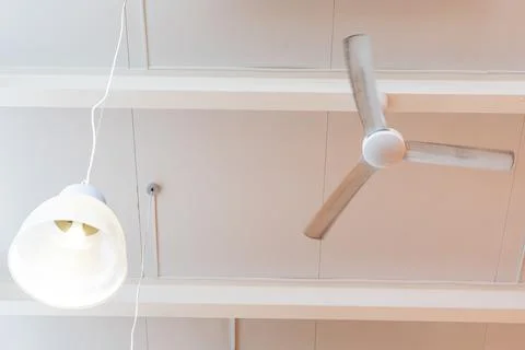 Ceiling fan in a cafe, interior ceiling fan decoration at home in hot summer, Stock Photos