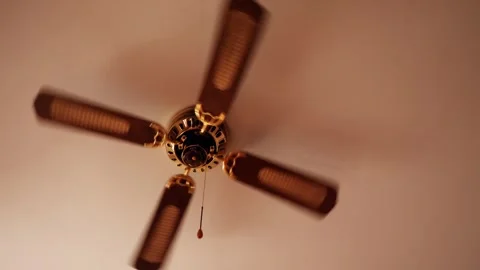 Ceiling fan. Creating air coolness on ho... | Stock Video | Pond5