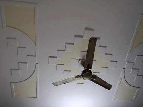 Ceiling fan with design pattern on roof 1 Stock Photos