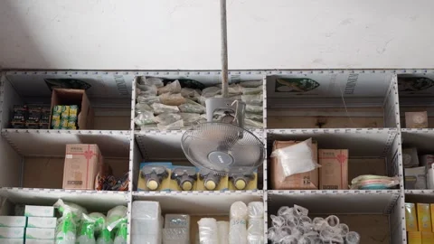 Ceiling fan, general store in Senegal Stock Footage 304963656