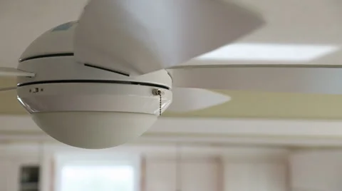 A ceiling fan gets turned on in the home Stock Footage 32888652