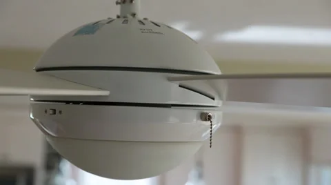 Ceiling fan slowing down in the house Stock Footage 32887275