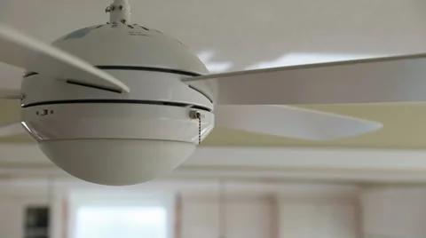 A ceiling fan turned on in home Stock Footage 32887241