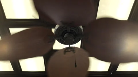A ceiling fan turns at a s clothes store Stock Footage 41096249