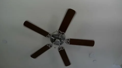 Ceiling fan on white ceiling Stock Footage 235395589