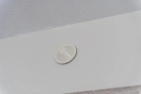 Ceiling Fire Sprinkler Head Installed in Modern Building Interior Stock Photos
