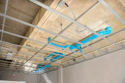 Ceiling frame made of metal profile at construction site Stock Photos