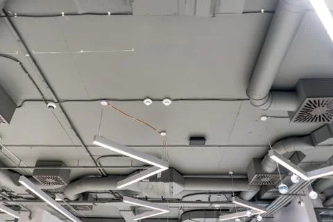 Ceiling infrastrustructure with different communications as a part of modern  Stock Photos