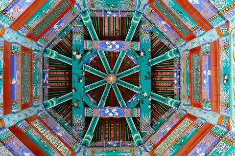 The ceiling inside a building with a colorful pattern on it Stock Photos