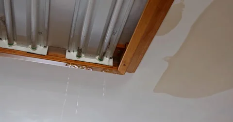 Ceiling kitchen in damage caused by a leaking water pipe Stock Footage 162997451