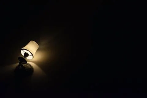 Ceiling lamp on a black background wall Stock Photos