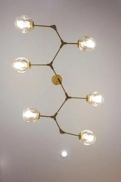 Ceiling lamp on the ceiling close-up 写真素材