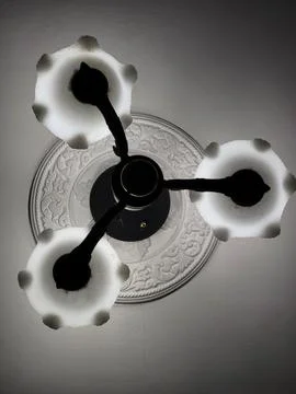 Ceiling Lamp with Three Bulbs Seen from Below Stock Photos