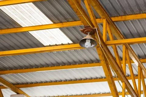 Ceiling lamp in warehouse. Stock Photos