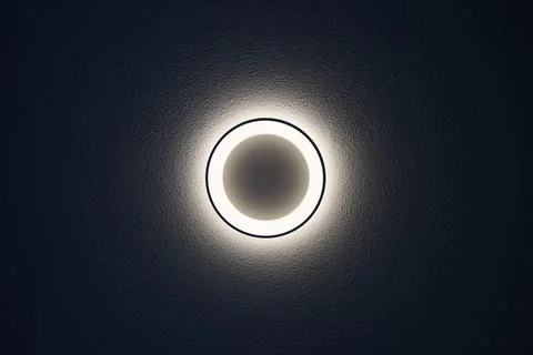 Ceiling light on black wall. Abstract background and texture for design. Stock Photos
