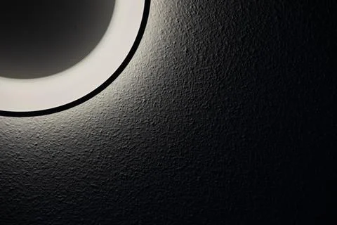Ceiling light on black wall. Abstract background and texture for design. Stock Photos