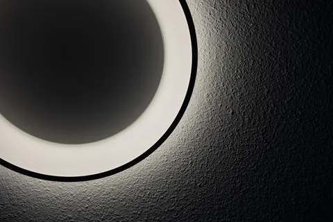 Ceiling light on black wall. Abstract background and texture for design. Stock Photos