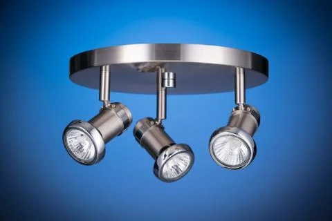 Ceiling light fixture isolated on blue background Stock Photos