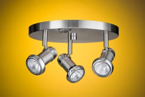 Ceiling light fixture isolated on yellow background Foto stock