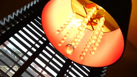 Ceiling light or chandelier with strings of circular beads Stock Footage 166660726