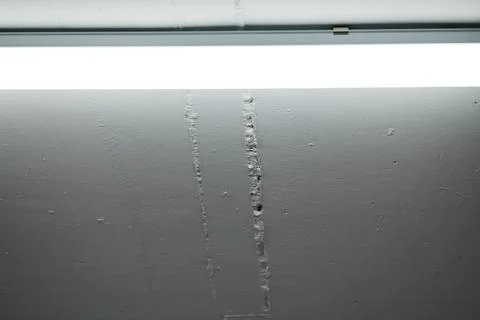 Ceiling with Linear Light and Textured Concrete Surface Stock Photos
