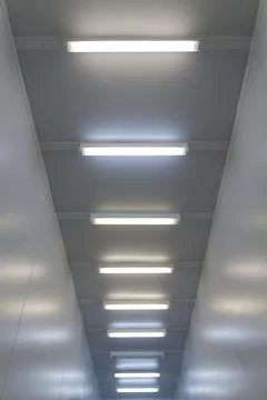 The ceiling with luminiscent lamps Inside white sterile cleanroom Stock Photos