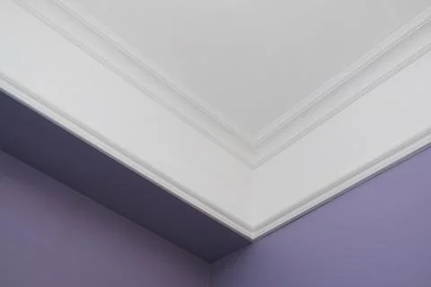 Ceiling moldings in the interior, detail of a angular ceiling skirting Stock Photos
