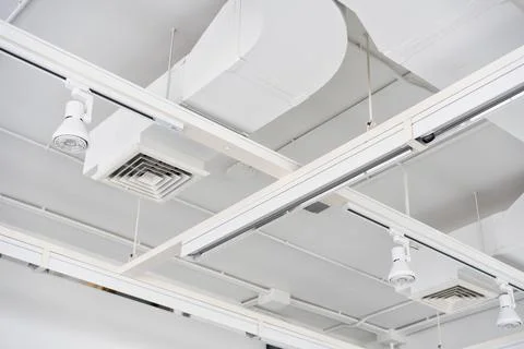 Ceiling mounted cassette type air condition units with other parts of ventila Stock Photos