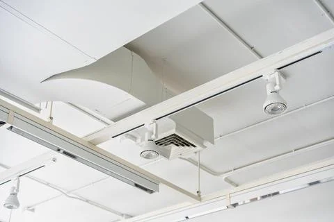 Ceiling mounted cassette type air condition units with other parts of ventila Stock Photos