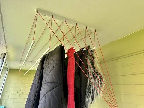 Ceiling-mounted clothes drying rack Stock Photos