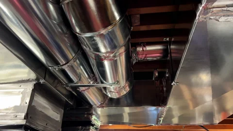 Ceiling mounted hvac system under insulated air conditioner return in home Stock Footage 203928279