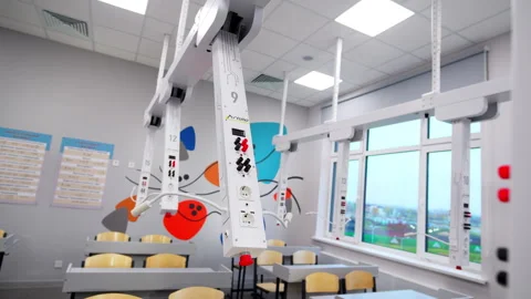 Ceiling-mounted power console provides electrical access 動画素材 332269191