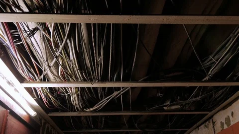 Ceiling pipe and wires in the building in the dark. Stock Footage 91513136