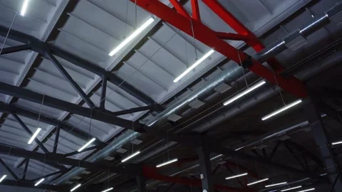 Ceiling with powerful glowing led lamps in spacious gym hall at sports complex 動画素材 234609607