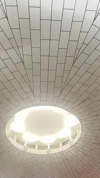 Ceiling with rectangular architecture and round light pole Stock Photos