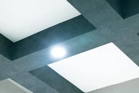 Ceiling studio light glare from lamp square shapes geometry pattern of indoor Stock Photos