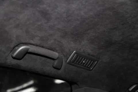 The ceiling of the SUV car pulled by black soft material alkantara in the wor Photos