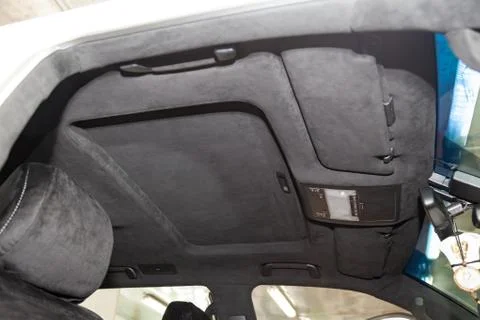 The ceiling of the SUV car pulled by black soft material alkantara in the wor Stock Photos