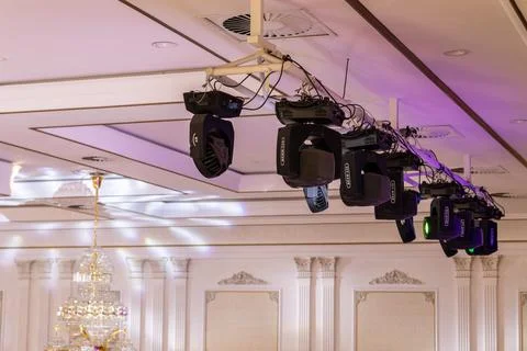 Ceiling truss with professional lighting equipment in the form of a beam head Stock Photos