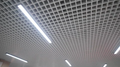Ceiling ventilation grid combined with bright narrow lights Stock Footage 324907221