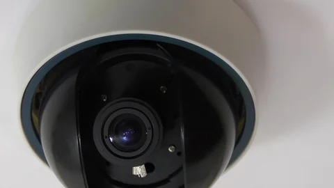 Ceiling video camera. Security. CCTV camera approaching. Vidéo 111149834