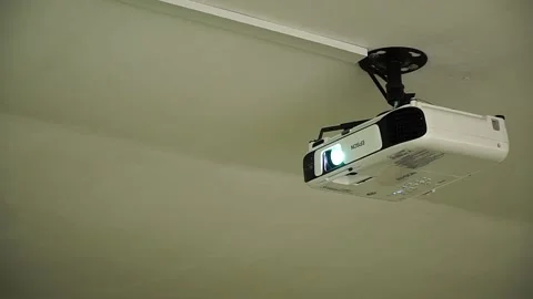Ceiling video projector. Projector Installed on the Ceiling of Conference Room Stock Footage 235890893