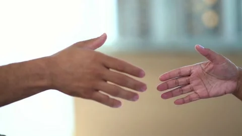Celebrating the agreement by shaking hands. Stock Footage 132071586