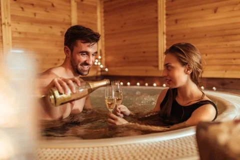 Celebrating with a bubbly Foto stock
