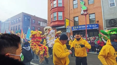 Celebrating Chinese Lunar New Year 2025 with dragon dances  Stock Footage 302222053