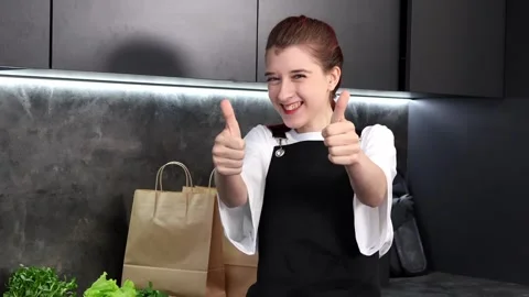 Celebrating culinary creativity in a modern kitchen with cooking excitement Stock-Footage 296318660