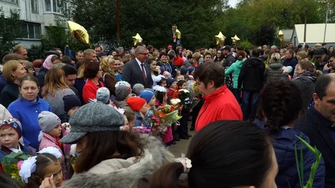 Celebrating the day of knowledge. Primary and elementary school children and  Stock Footage 119220672