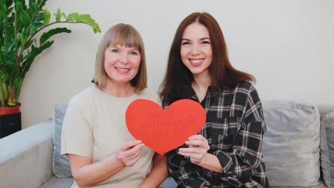 Celebrating love and connection between a mother and daughter on Mothers Day Stock Footage 317538352