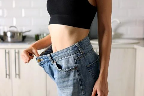 Celebrating the Successful and Transformative Weight Loss Journey with a Pair of Stock Photos