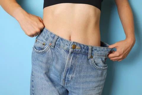 Celebrating the Successful and Transformative Weight Loss Journey with a Pair of Stock Photos
